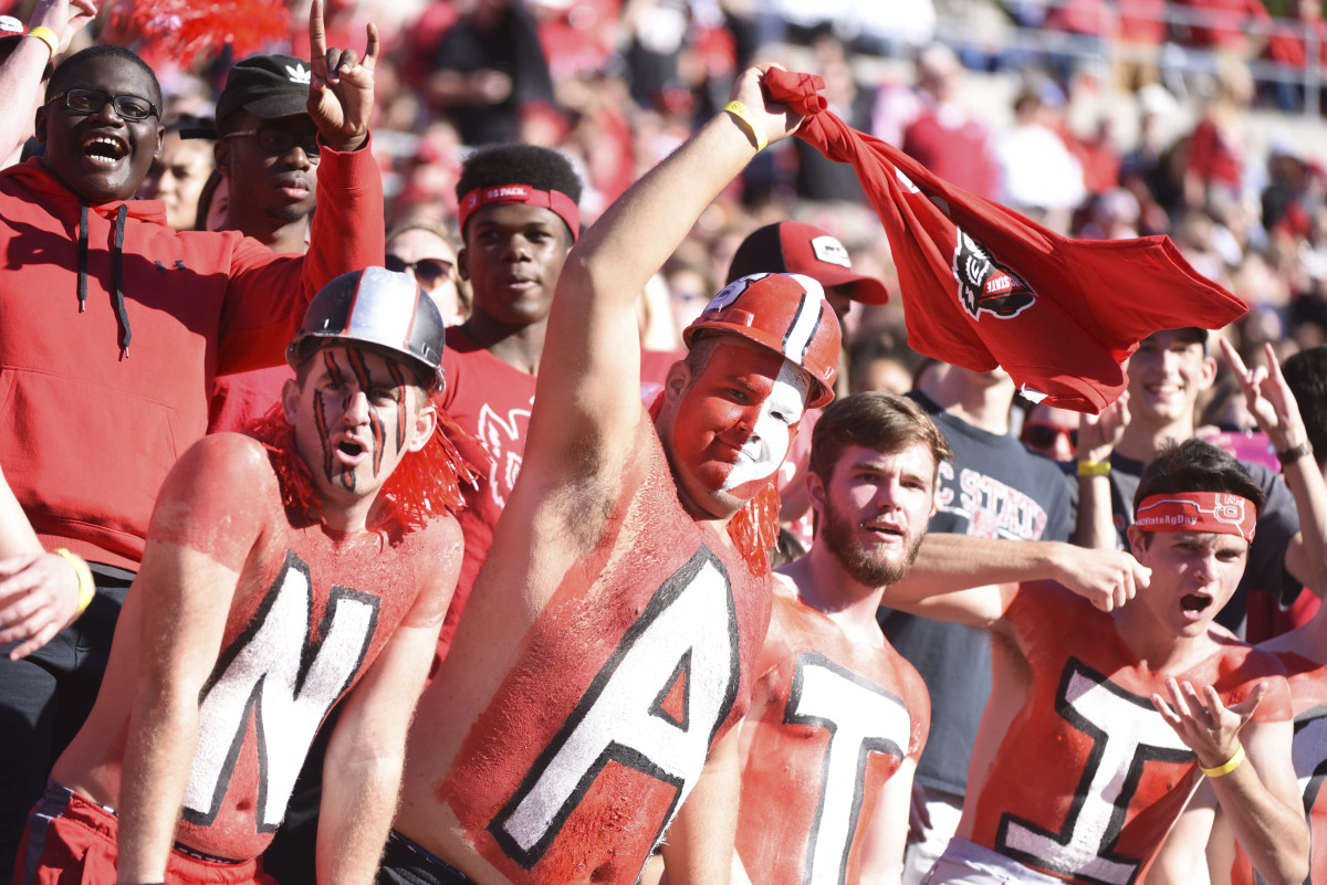 Wolfpack fans cheer during the first half against the Florida State Seminoles at Carter-Finley Stadium. (Rob Kinnan-USA TODAY Sports)